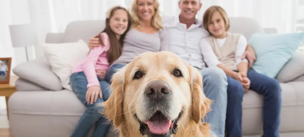 family with cute puppy