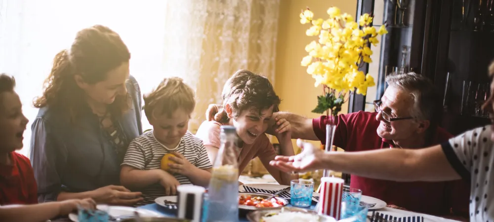 family eating at kitchen table 