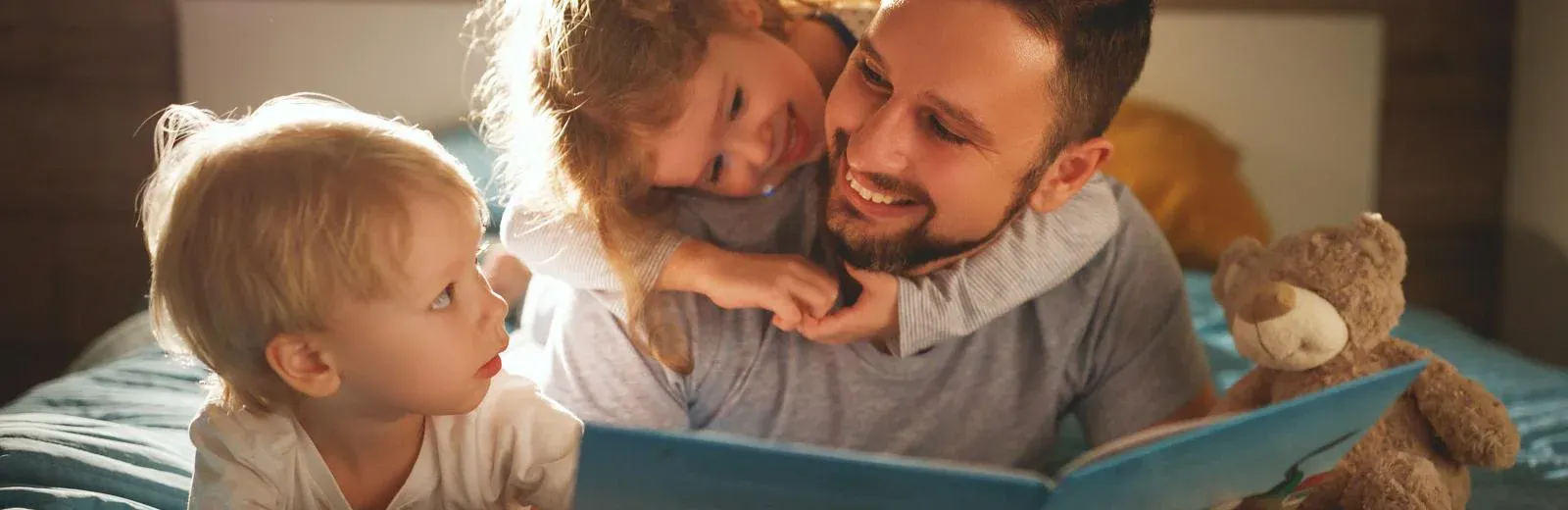 family reading a book