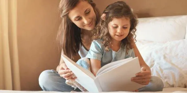 mother and daughter reading
